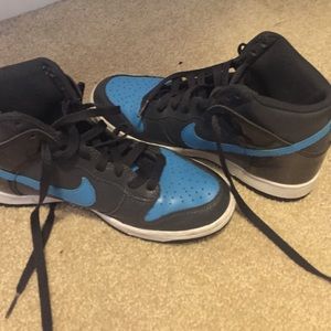 Blue and gray Nike high tops