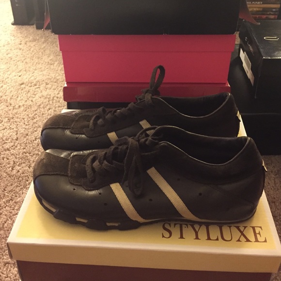 Brown suede/leather shoes.