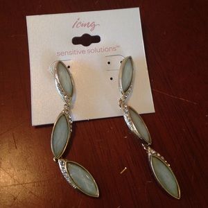 Cute light green and gold colored earrings