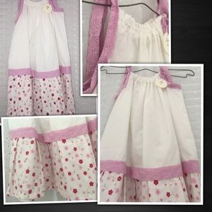 White cotton dress with floral trim