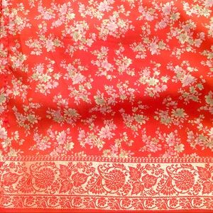 Beautiful floral print orange saree