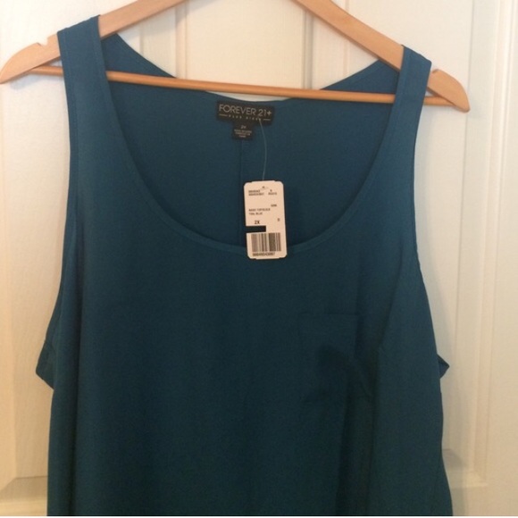 Satin sleeveless, scoop neck top, skinny pants