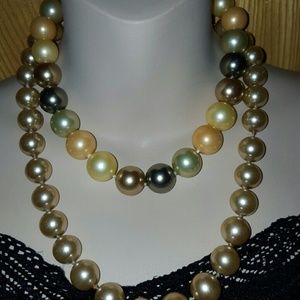 big chunky statement like pearl necklace.