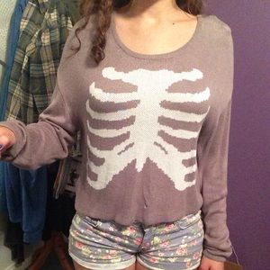Slightly cropped rib cage sweater