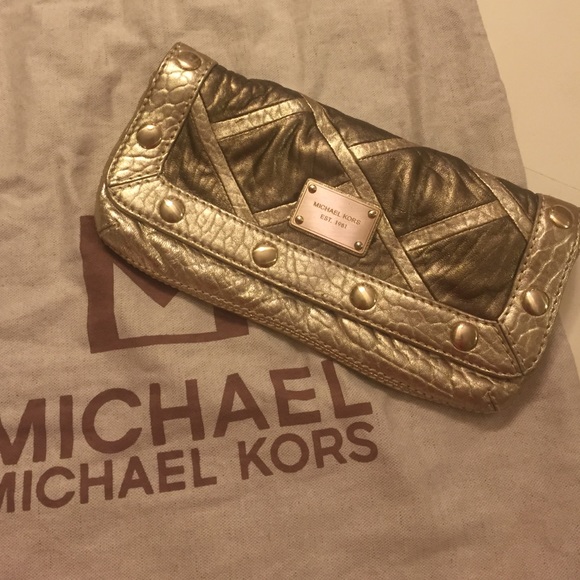*Authentic* Michael Kors gold clutch