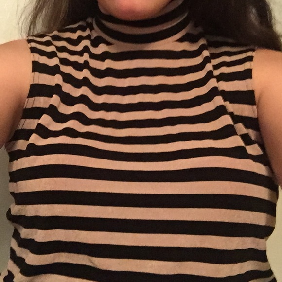 Sleeveless turtleneck blouse