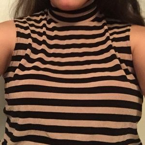 Sleeveless turtleneck blouse