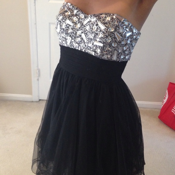 A women's strapless black Homecoming dress
