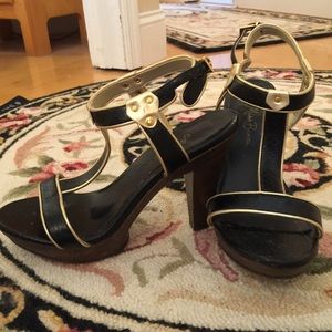 Black and gold shoes