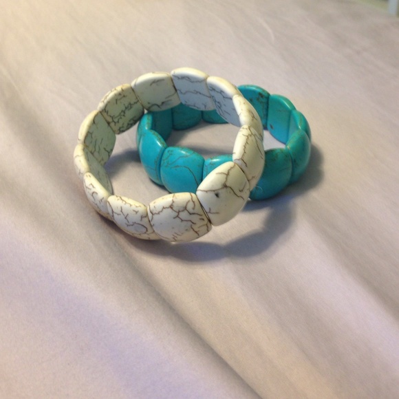 Two chunky bracelets one teal and one white