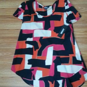a dkny shirt color flaunt with orange white lipsti a dkny shirt color flaunt with orange white lipsti