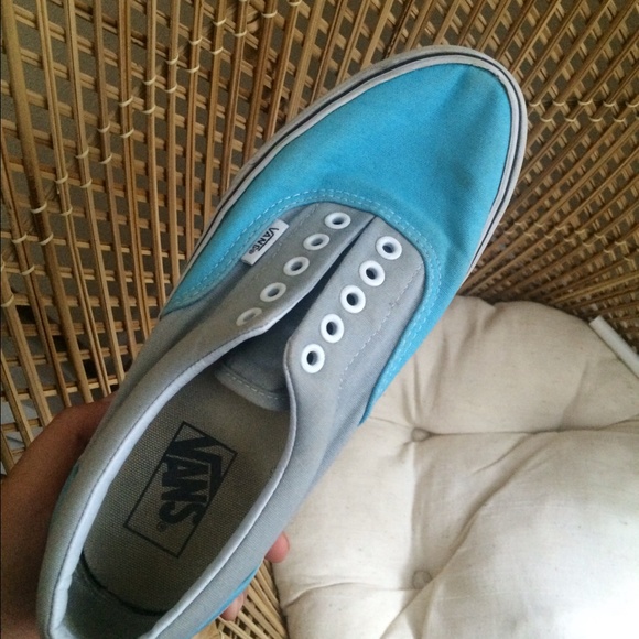 blue and gray slip-on vans