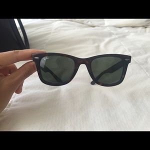 Ray-Ban Tortoise Classic Wayfarer with 50 mm lens.
