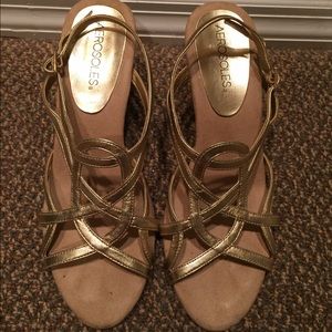 Gold shoe with tiny heel