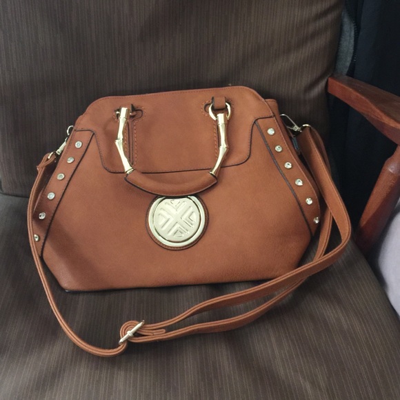 Brown handbag with shoulder strap