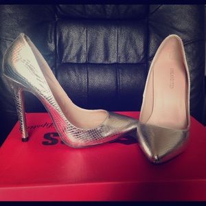 Shiny silver crocodile print heels