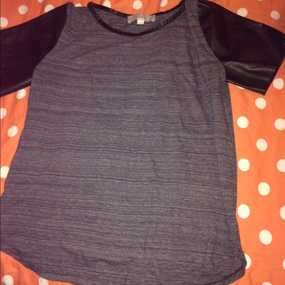 Gray shirt with leather on the arms