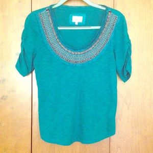 Turquoise shirt with beaded scoop neck