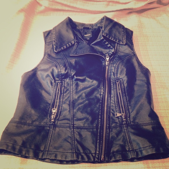 Minus the leather Moto vest. Faux that feels real!