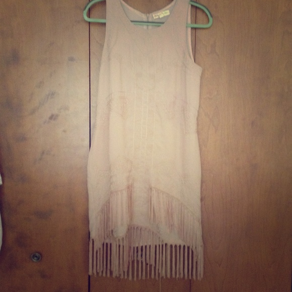 Tan dress with fringes on the bottom