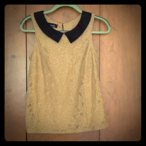 Tan shirt with black collar