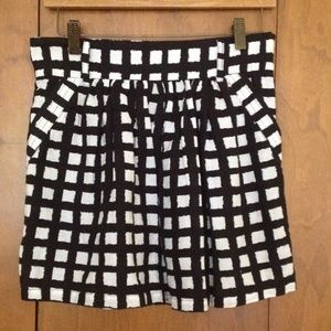 Black& white patterned, high waisted skirt.