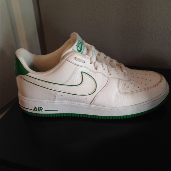 Green and white Nike Air