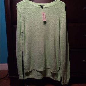 Light green knitted long sleeve top.