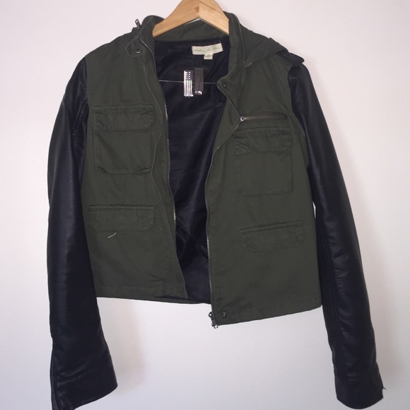 Green jacket with leather sleeves