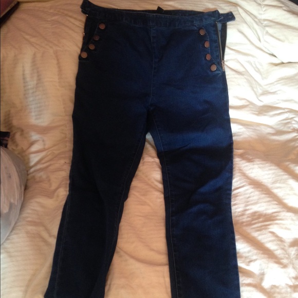 Blue jeans with buttons and zippers - Picture 1 of 4