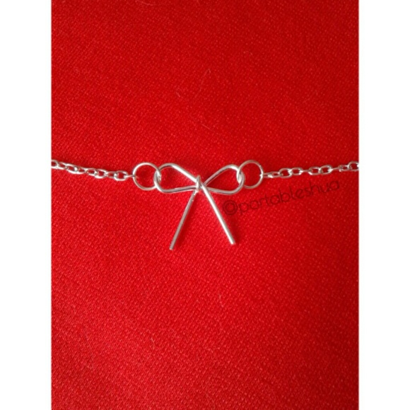 Jewelry - NWT - Silver Dainty Bow Necklace