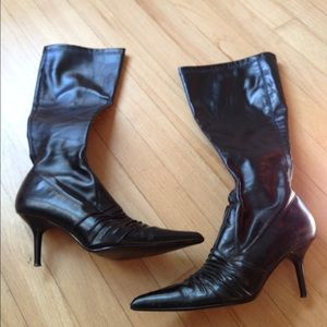 Steve Madden tall boots, man-made upper material.