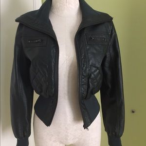 Dark green Jou Jou leather jacket.