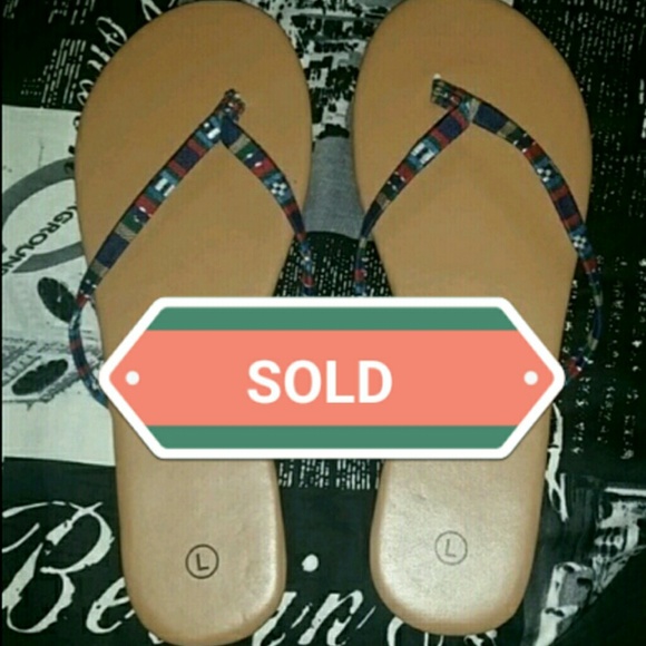 SOLD Never worn Flip flops size 9