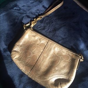 Gold Coach wristlet!