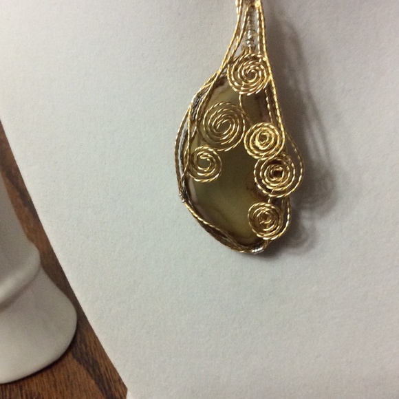 Tan and grey agate slice pendant