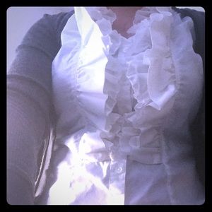 White ruffled button down sleeveless