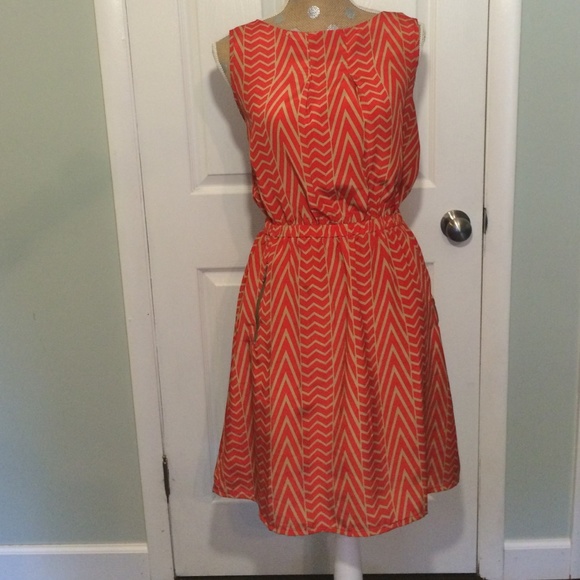 Orange and tan dress by Cato, size large