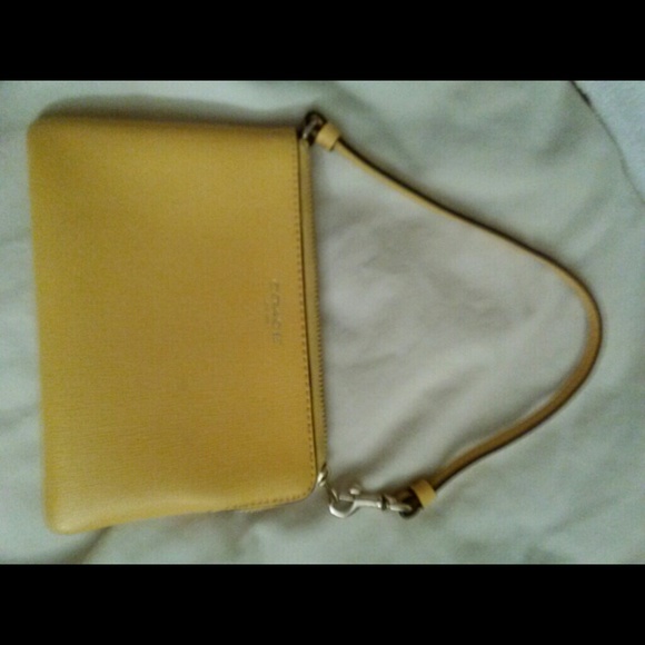 Brand New Yellow Coach Wristlet.