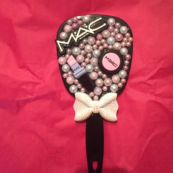 Small hand held mirror