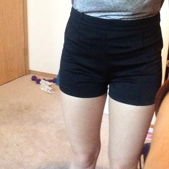 Black pleated shorts