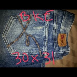 Name brand jeans and Capri's