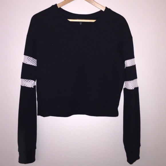 Crop sweater with cutout detail on sleeves