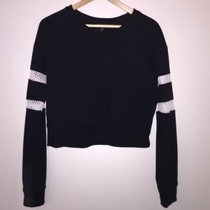 Crop sweater with cutout detail on sleeves