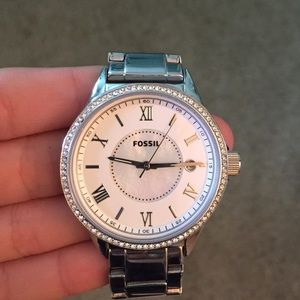 Women's small silver fossil watch