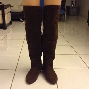 Brown knee high suede boots
