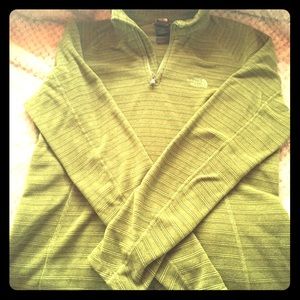 Green north face pull over