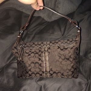 Small, dark brown, Coach purse