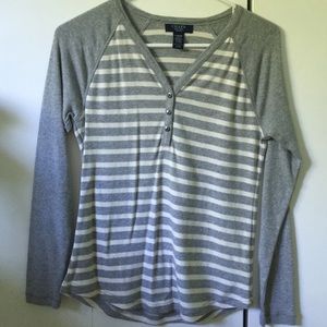 A grey and white striped shirt never worn!