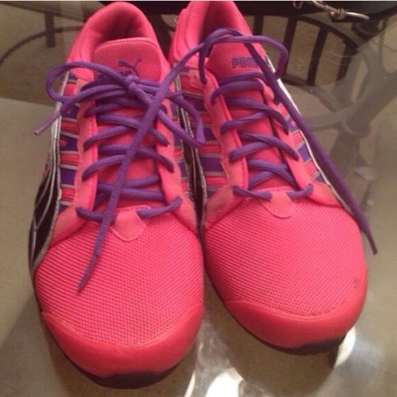 Bright pink and purple puma shoes